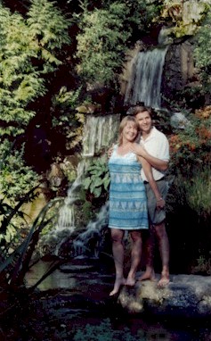 A Lovely Couple by a Waterfall